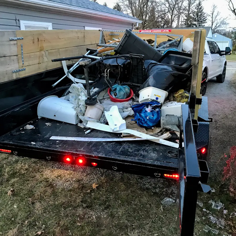 Roll-off dumpster delivered to a residential driveway in Fort Defiance